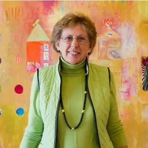 Kathy Hull, woman wearing green and facing the camera