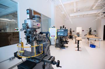 STEM machines inside a room with tables 