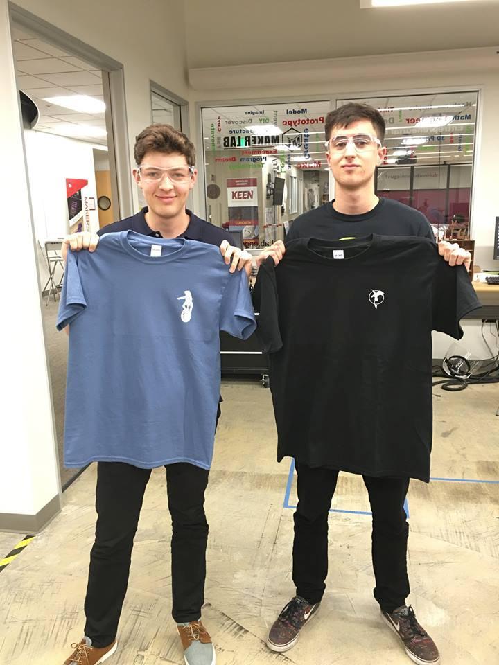 Students showing off their custom shirts they created Picture 1
