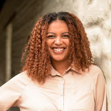 headshot of zia malangalila