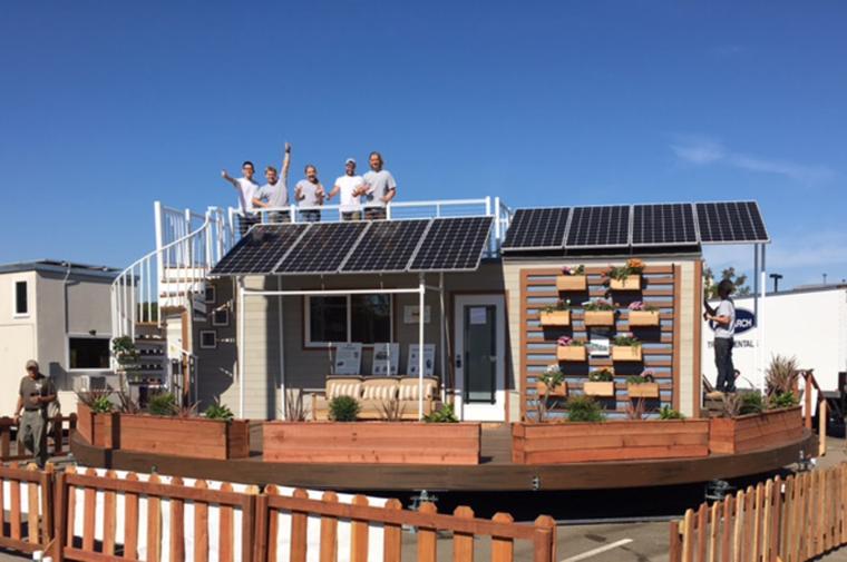 The 2016 SCU Tiny House team standing on top of their completed project