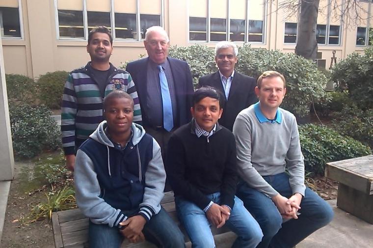 Electrical Engineering's Electron Devices Laboratory PhD students and graduates, seated, from left: Constant Bossou, S.J., Abdus Sattar, Mark Barycza; standing: Krunal Patel, Norman Gunther, John Rose Santiago, S.J.