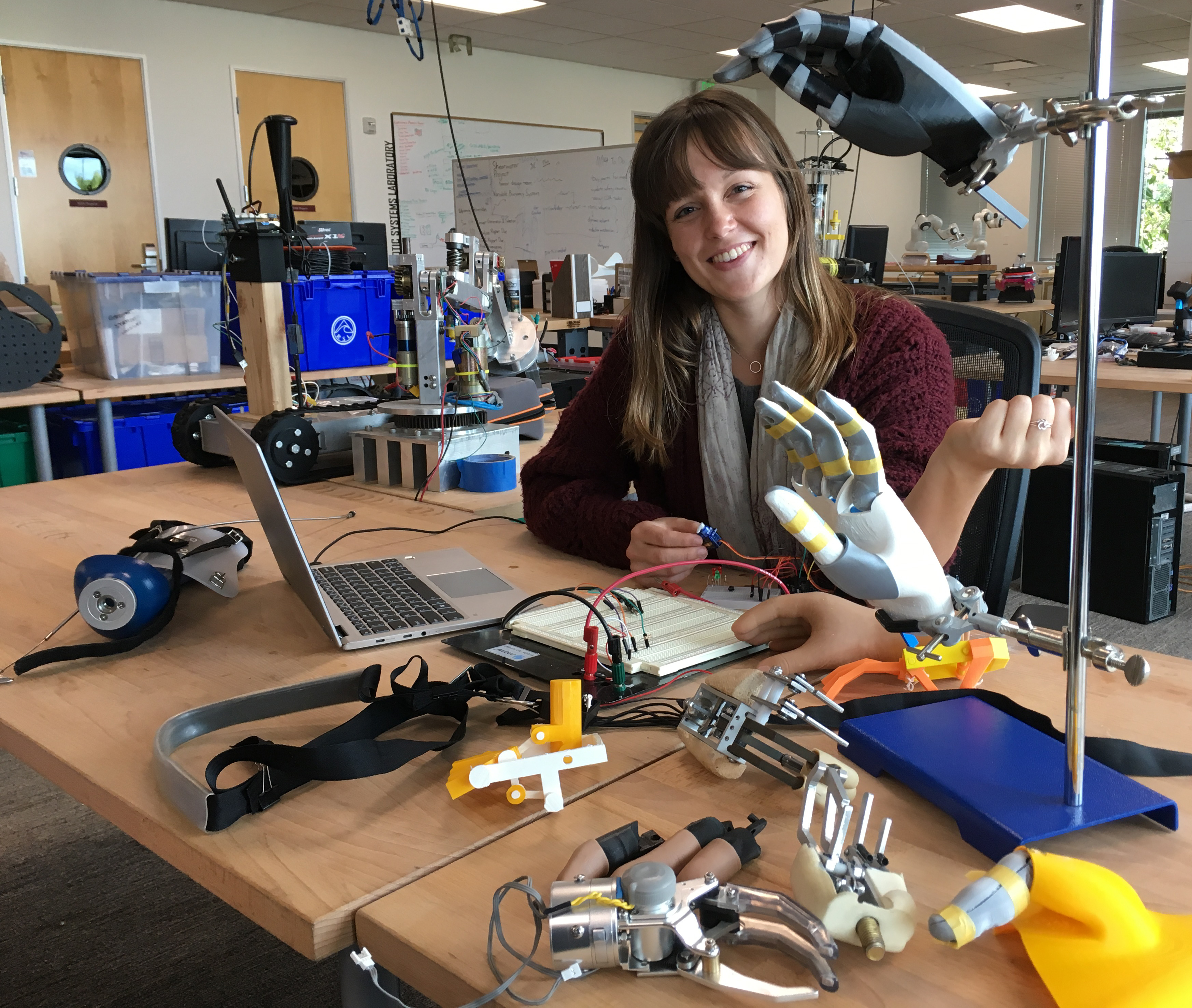 Jamie Ferris '19 at work on the HELP Hand image link to story