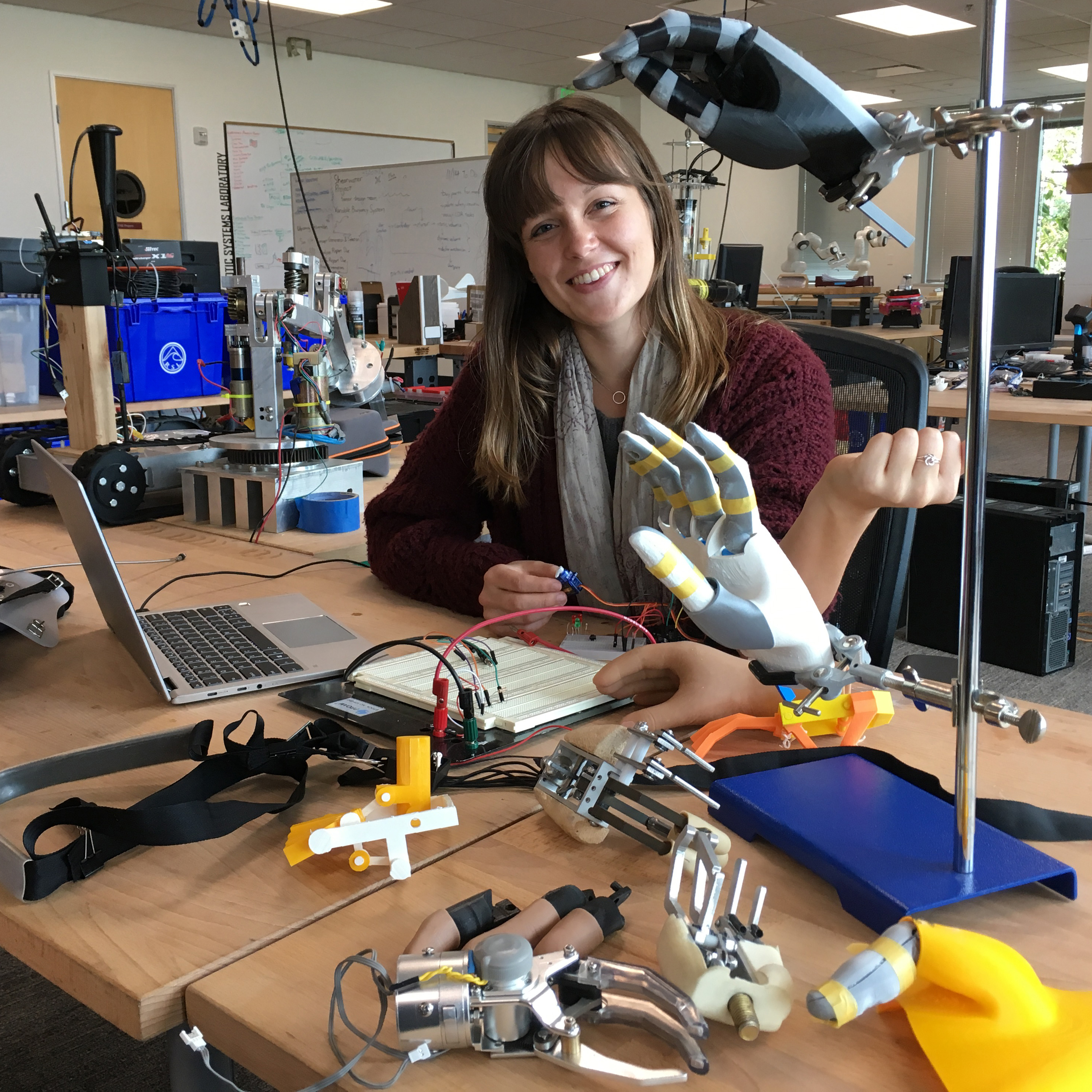 Jamie Ferris '19 working on the HELP Hand image link to story