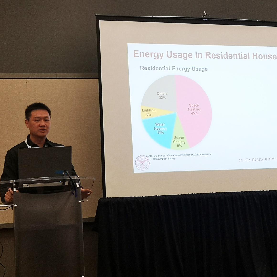 Ph.D. student Chenli Wang delivering a poster presentation at a conference