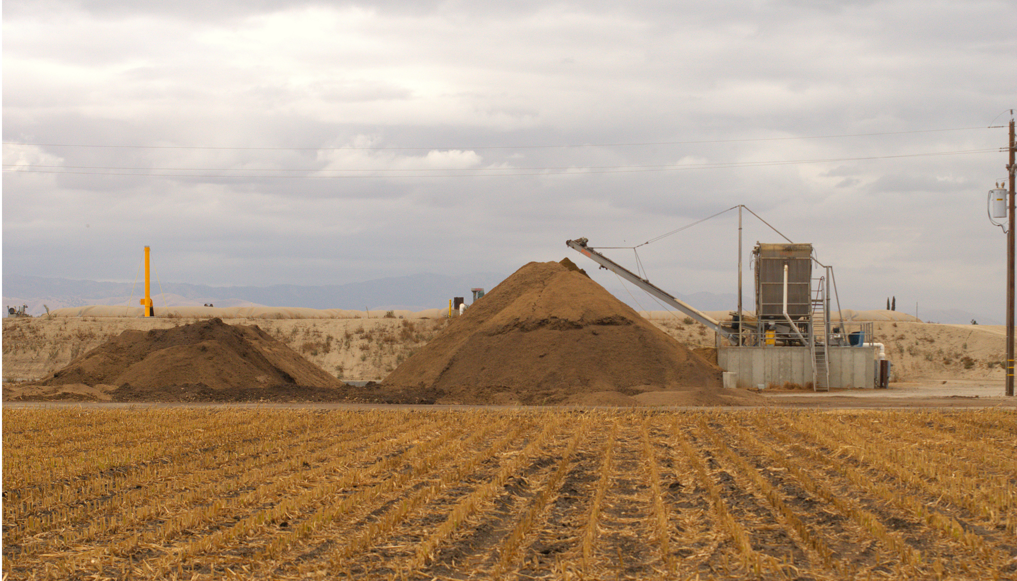 Manure Piles from CAFO Operation Next to Domestic Well Sampling Site