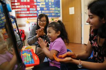 Computer engineering graduate students Yan Long and Sonam Rudraraju at Chandler Tripp Preschool