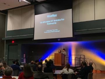 HS IEEE presentation event with audience and stage.