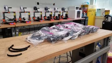 Face shield parts being printed in Maker Lab