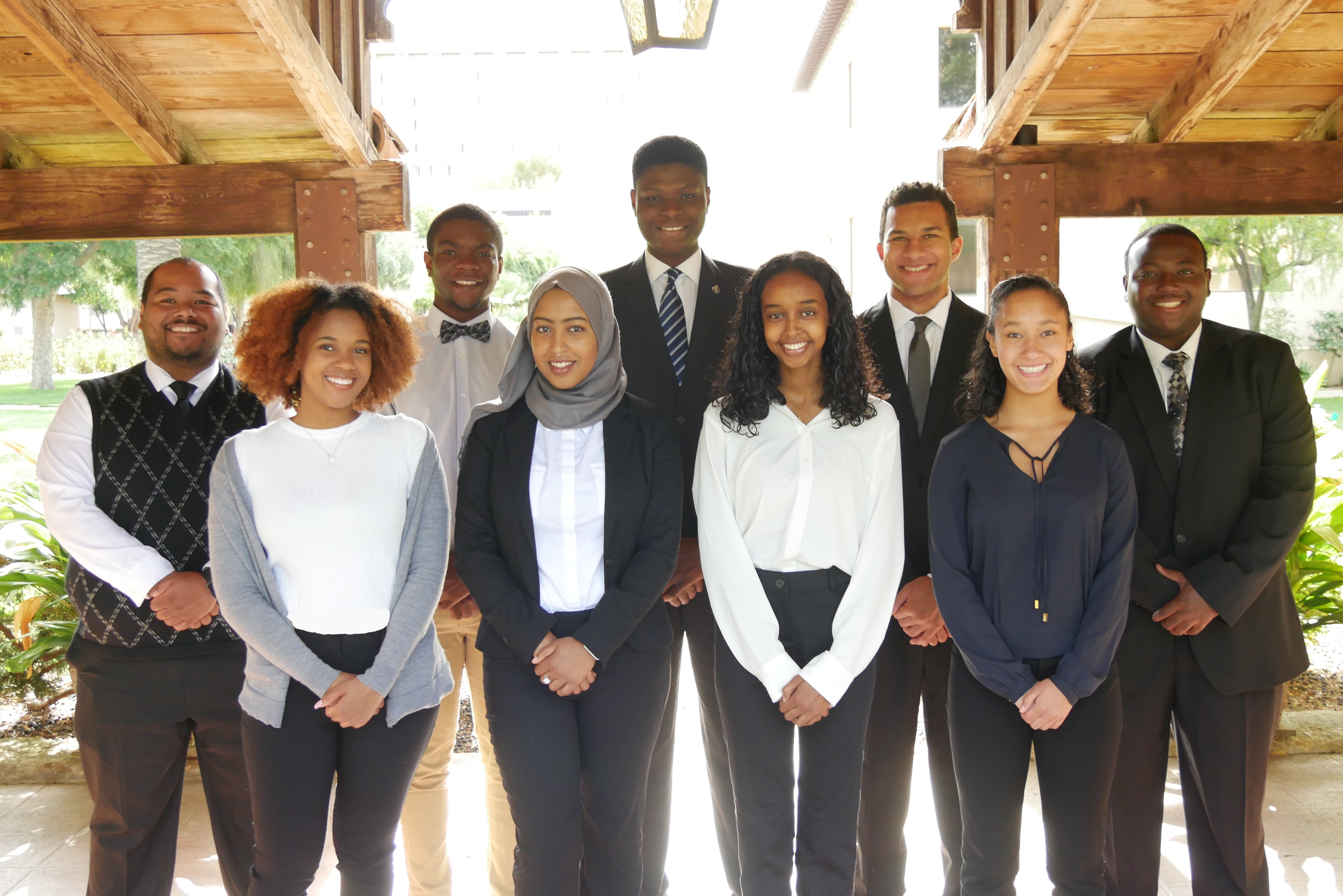 NSBE 2018-2019 Executive Board standing in formal attire.