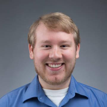 headshot of scot tomer