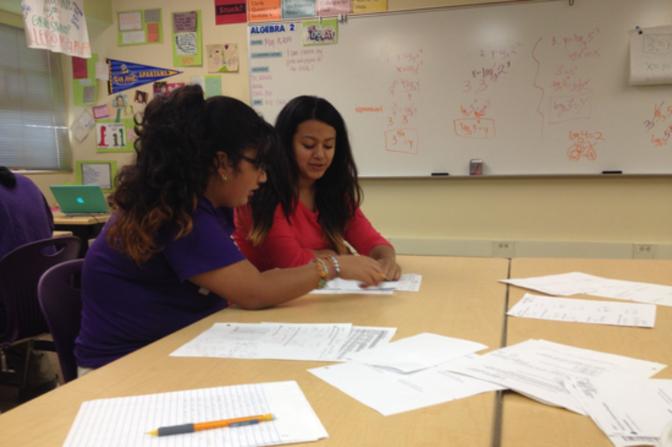 Elevate Tutoring trains and pays college students to tutor middle and  high school students. image link to story