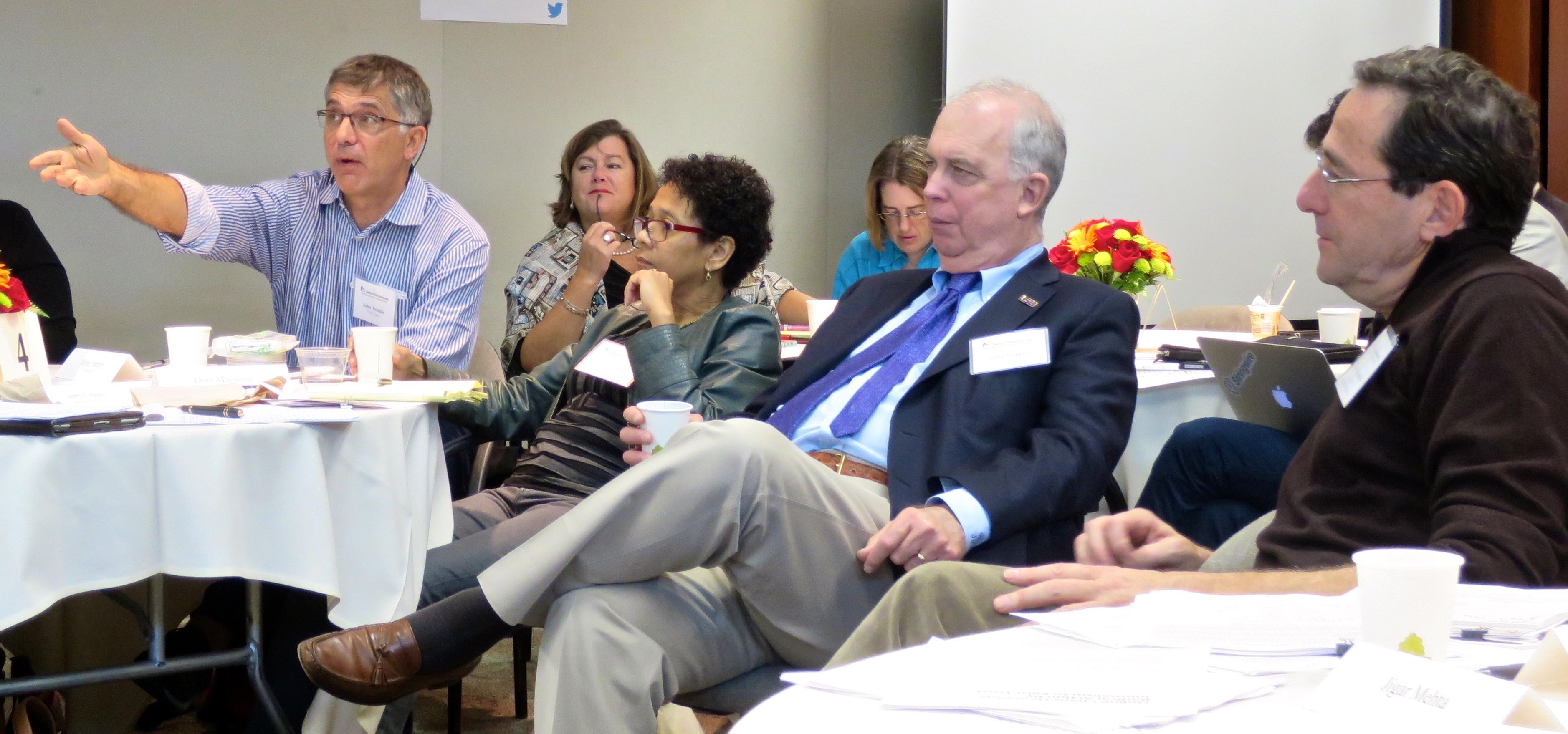 Members of the Executive Roundtable on Digital Journalism Ethics debate an issue. (Photo by Fabrice Florin under a Creative Commons License.)